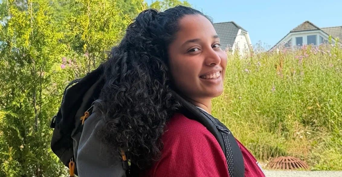 Volunteer with a backpack ready to travel to the mission in Venezuela